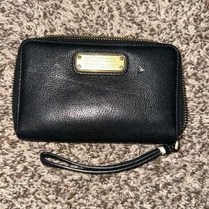 Real Marc Jacob’s Wallet. Used Classic. Still charming and works great.